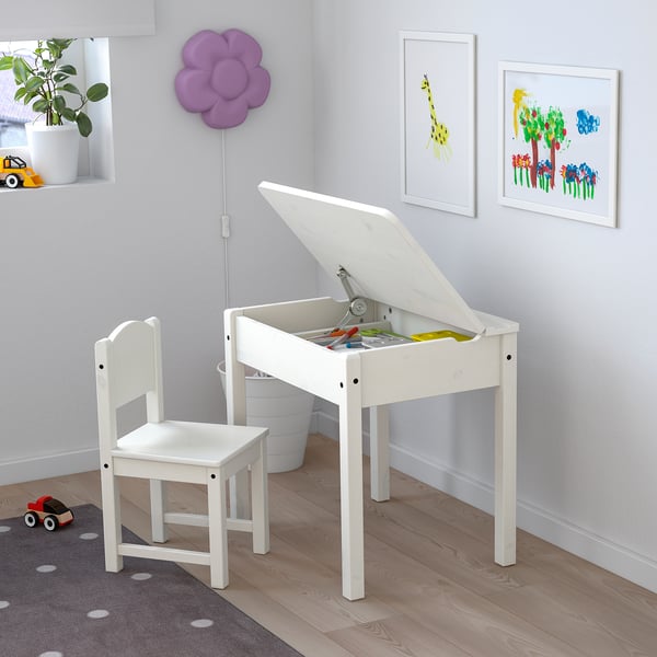 SUNDVIK kids white desk and chair. Small, bright, wood, storage within, fits corner.