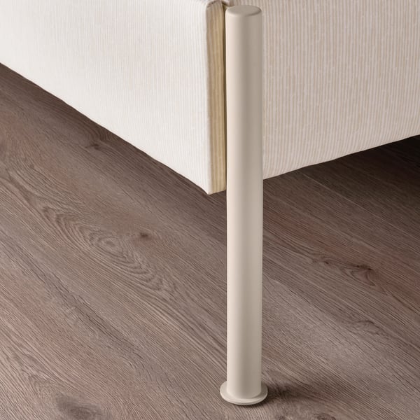 Minimalist bed leg, smooth beige finish, sturdy galvanised steel base, striped headboard, clean modern design.