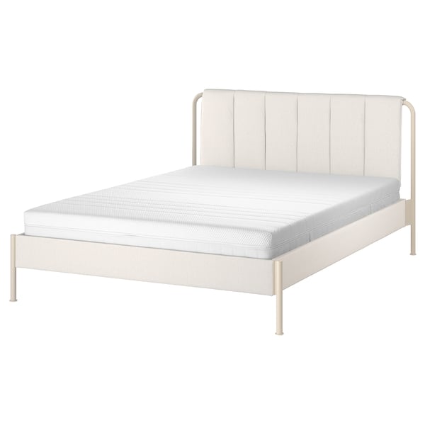 Modern bed: white TÄLLÅSEN with padded headboard, slim metal legs, striped upholstery.