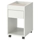 A TONSTAD white rolling cabinet with one drawer and open storage, showcasing minimalist design and functionality.