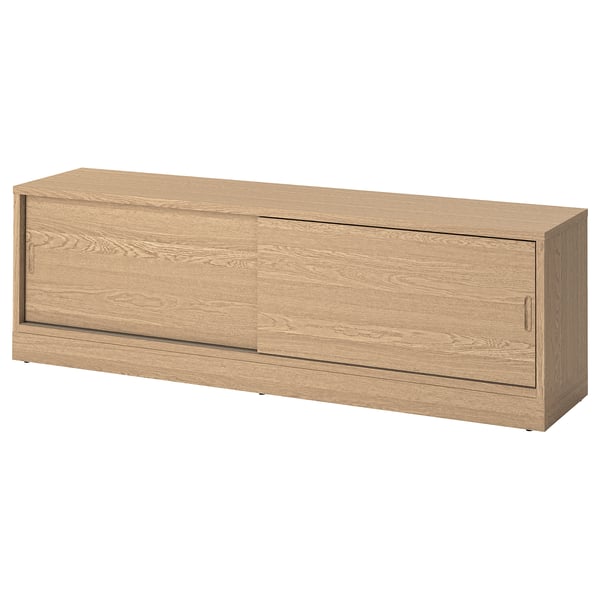 Oak tv bench with sliding doors and cable management. Or tv bench with oak veneer, sliding doors, cable management.