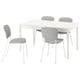 Extendable table and four upholstered chairs, modern design.
