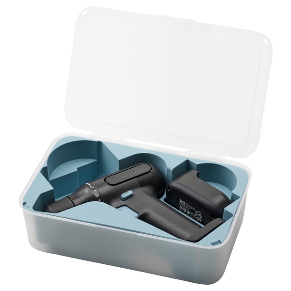 Open blue-gray TRIXIG toolbox with black cordless drill inside. Made of recycled plastic, ergonomic design, led light.