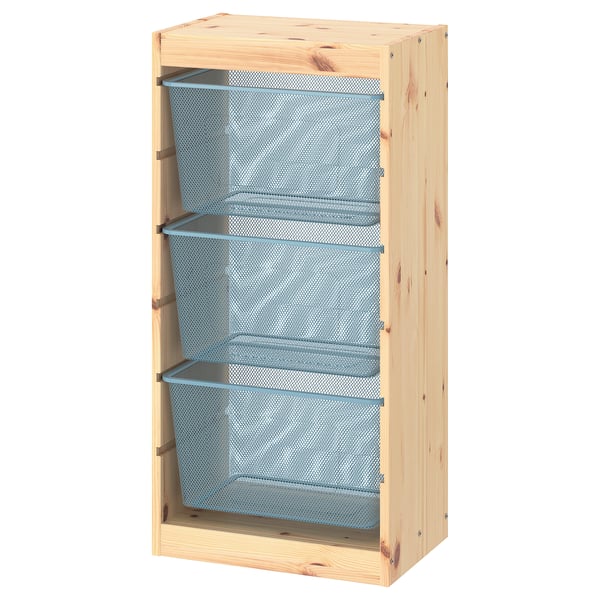 A TROFAST storage unit with three blue mesh cubes in a light pine frame. Designed for organising items.