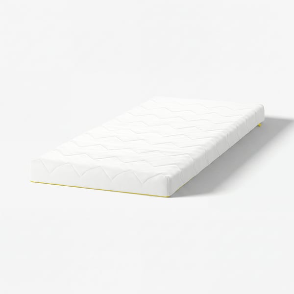White junior mattress, egg-patterned, rectangular, rolled, yellow zip by IKEA.