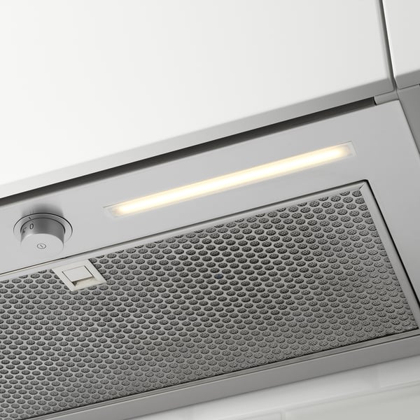 Modern undercabinet range hood with sleek design, bright led lighting, and a perforated metal philtre.