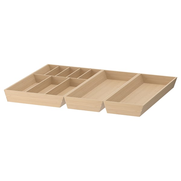 Three UPPDATERA bamboo cutlery trays. Light brown, rectangular, with multiple compartments. Ideal for organising kitchen drawers.