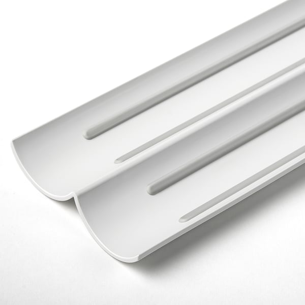 White plastic spice rack insert with anti-slip for organised drawer storage.