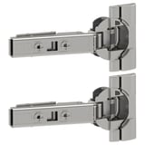 Two UTRUSTA snap-on cabinet hinges with nickel-plated steel finish. They feature adjustable mounting and integrated slow-close dampers.