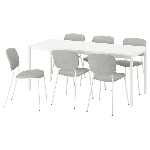A VIHALS dining set with a white extendable table and four grey chairs. The chairs feature minimalist designs with padded backrests and seats.