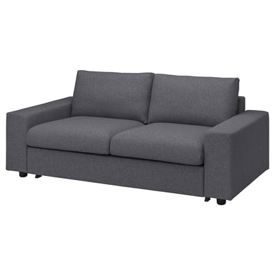Dark grey VIMLE sofa, modern design, rectangular shape, with plush cushions and adjustable sections.