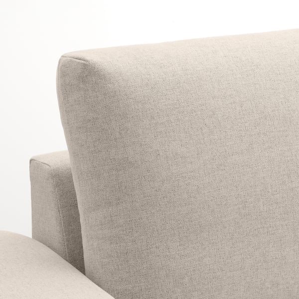 Comfortable modern sofa with a sleek, beige cover, designed for relaxation. High resilience foam for support, showcasing quality craftsmanship.