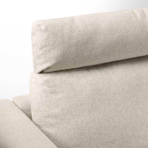 A close-up of a modern sofas armrest and cushions, highlighting the premium fabric and comfortable design.