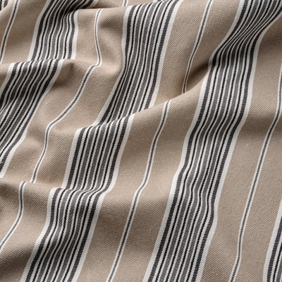 Striped fabric close-up; soft, natural cotton texture, vertical lines in neutral tones.