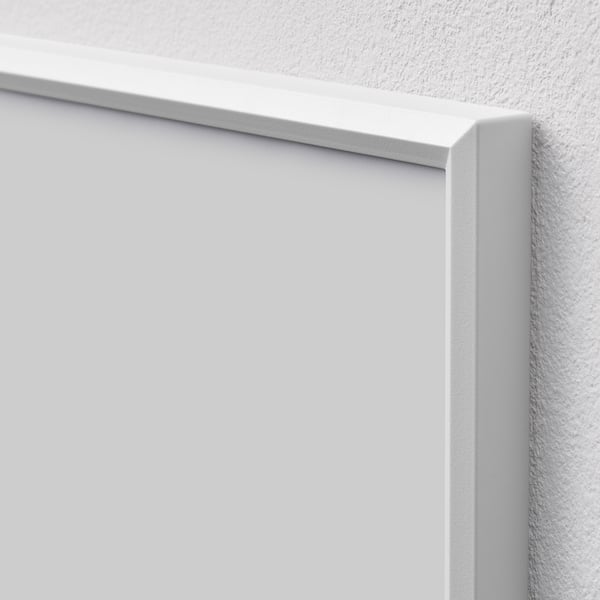 Close-up view of a white picture frame corner, showcasing smooth, high-quality edges.