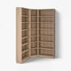 Light brown wooden BILLY bookcase fills room corner, featuring adjustable shelves, smooth surfaces, and a clean, modern design.