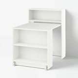 A white BILLY bookcase with a pull-out table. It has an open design with visible shelves and a rectangular shape, perfect for small spaces.