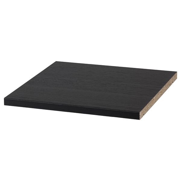 A black, rectangular BILLY shelf made of particleboard and plastic edging.