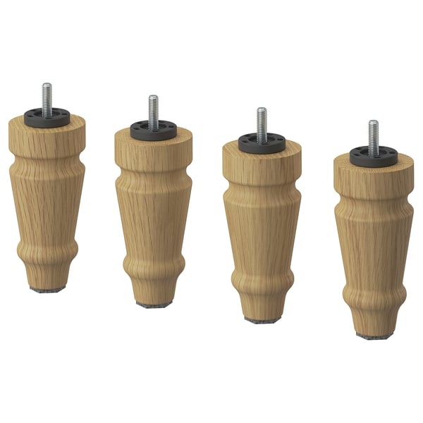 Four wooden furniture legs with metal inserts, light brown colour, tapered design.