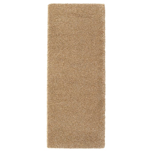 Beige polypropylene carpet runner with rubber backing, rectangular and plush.