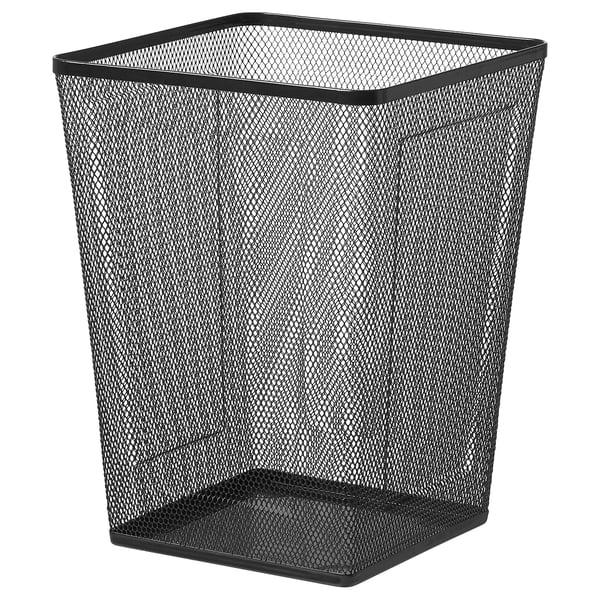 The DRÖNJÖNS wastepaper basket is black, square, made from metal mesh with plastic feet for floor protection.