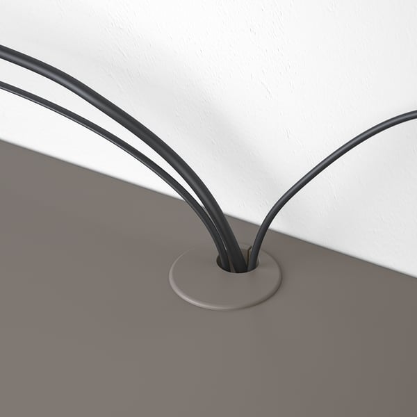 Grey EKET cable management shelf, wall-mountable, showing streamlined design with neat cable routing.