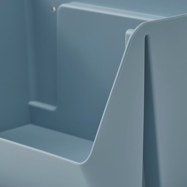 White plastic storage bin detail, showing smooth edges and sturdy construction.