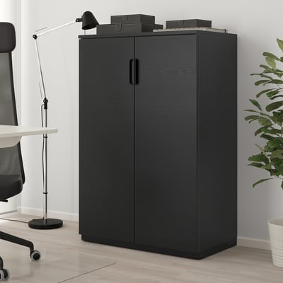 Black GALANT storage cabinet with double doors, ash veneer, office setting.