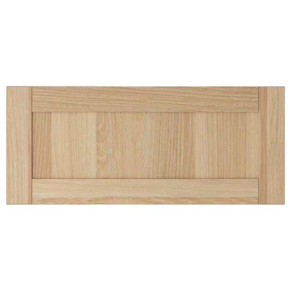 A HANVIKEN light oak wooden drawer. Its light colour adds a warm touch, and its made of fibreboard with a smooth finish.