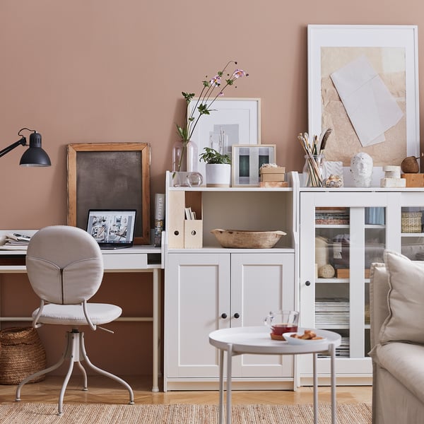 Home office: HAUGA storage, laptop, chair, peach wall