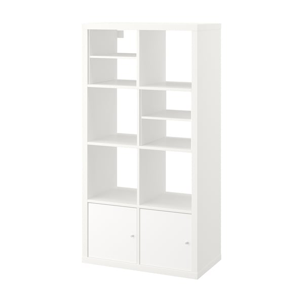 White KALLAX bookshelf with open and closed compartments.