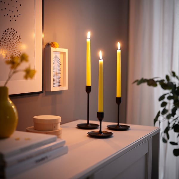 KLOKHET Unscented taper candle, pale yellow, 25 cm 6 hr