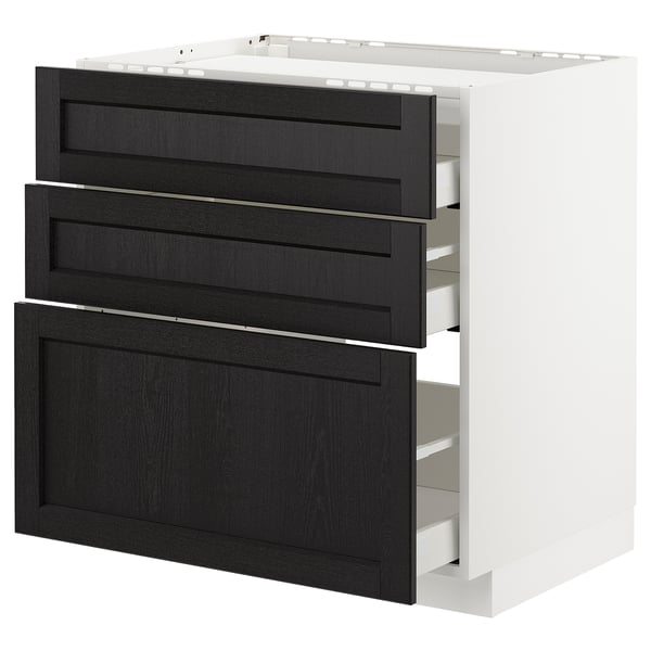 Modern kitchen unit with three black wooden drawers and white frame.