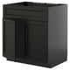 Black METOD kitchen cabinet with ash drawers and doors.