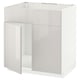 A white METOD kitchen cabinet with a glossy finish. The cabinet is rectangular, designed for a modern kitchen, with clean lines and a minimalist look.