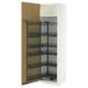 A white METOD kitchen cabinet with pull-out spice racks in black metal.