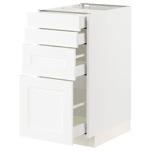 A white METOD kitchen cabinet with multiple drawers. It a sleek, modern design with clean lines and smooth surfaces.