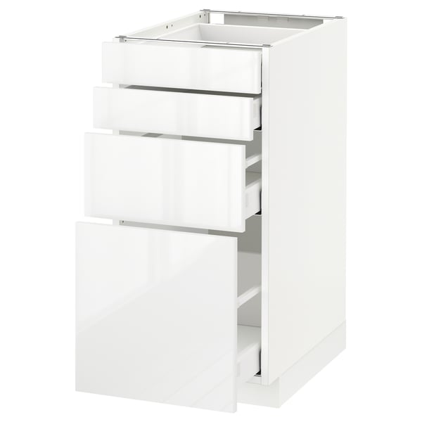 METOD kitchen unit. White, glossy finish. Three open drawers, sleek design.