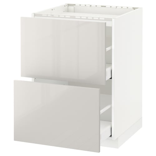 White METOD kitchen cabinet with high-gloss drawer fronts.