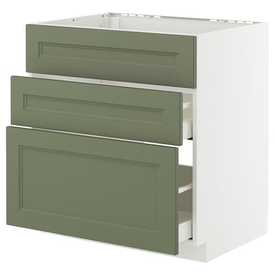Green METOD kitchen unit with three drawers.