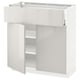 Modern white high-gloss kitchen unit with open shelves.