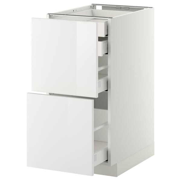 METOD white kitchen cabinet with three drawers, glossy finish, modern design.