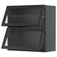Modern black kitchen cabinet with sleek glass and reeded design.