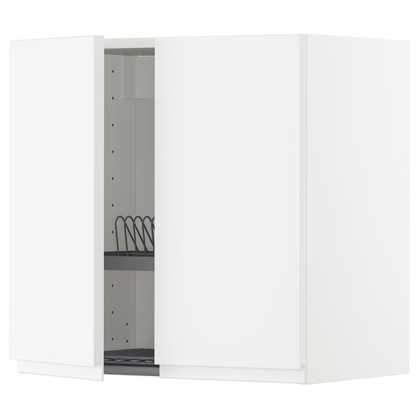 A white METOD kitchen cabinet with a single open door revealing side shelves and a dish drainer.
