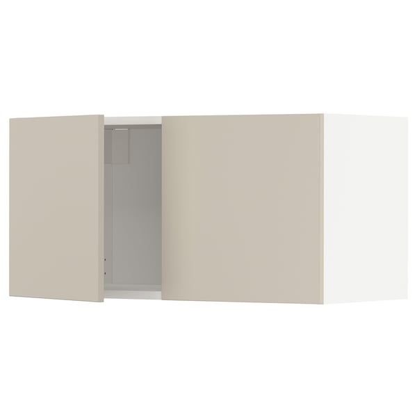 A beige METOD kitchen cabinet, featuring smooth, sleek doors with a modern design.