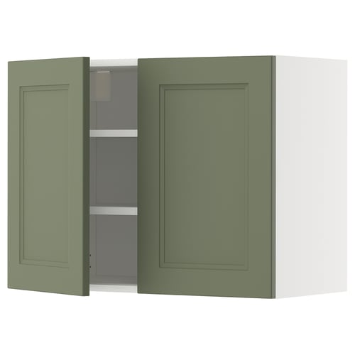 Green kitchen cabinet, two doors, wall-mounted, rectangular, modern design, filled with shelves.