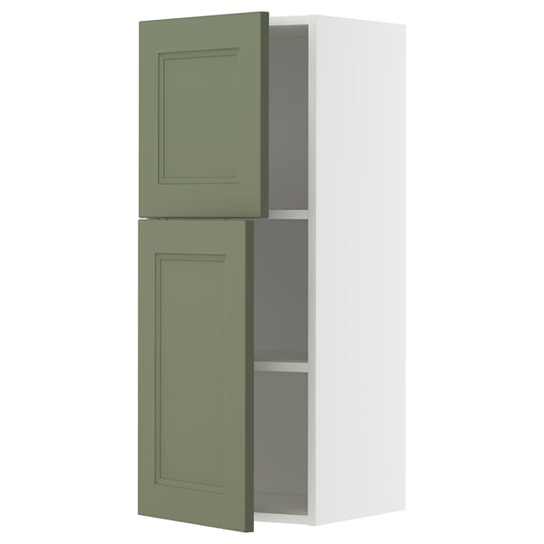 A METOD tall kitchen cabinet with axstad green doors and a white body, featuring a simple and modern design.