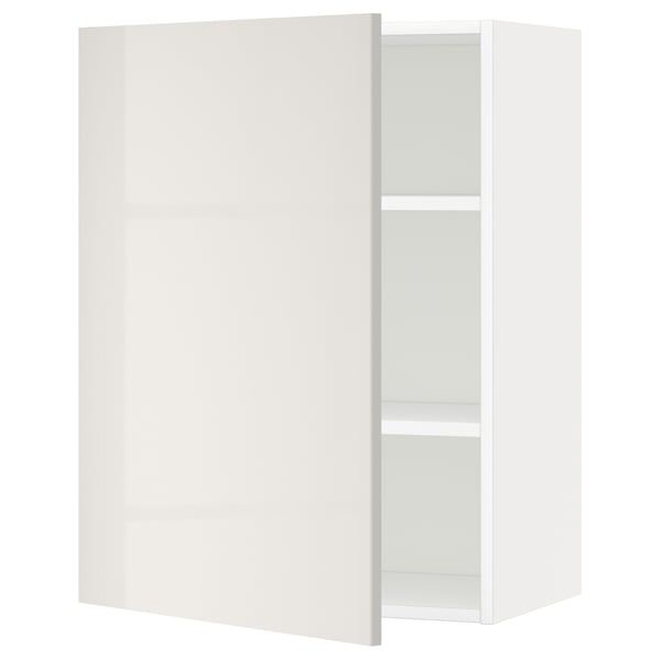 A white METOD kitchen cabinet with a sleek, high-gloss finish and two adjustable shelves. Rectangular, modern design with clean lines.