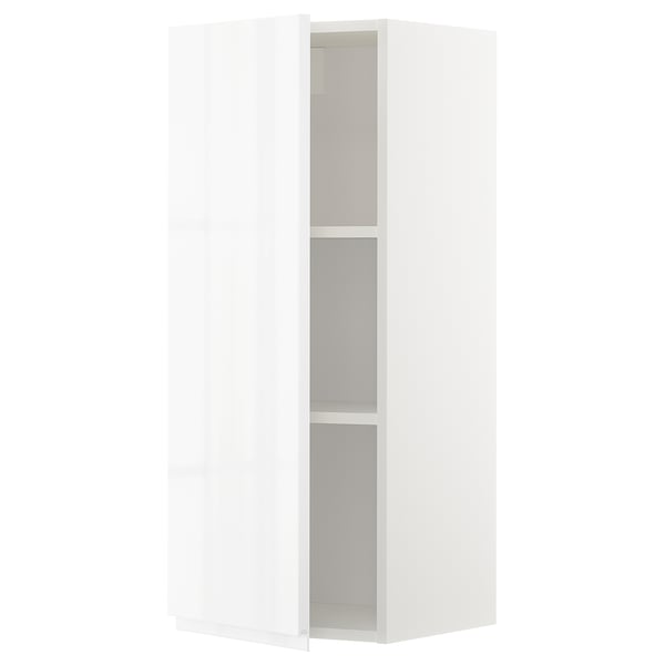 A white high-gloss METOD kitchen cabinet with two adjustable shelves. The sleek, modern design handle-less doors.