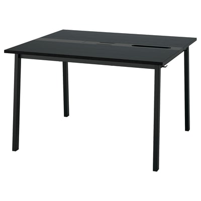 The MITTZON conference table is black, rectangular, with metal legs, and has built-in cable management.